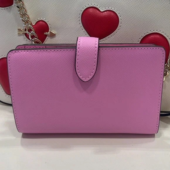 Kate Spade Madison Medium Bifold Wallet
Surf Pink
NWT - Picture 10 of 16